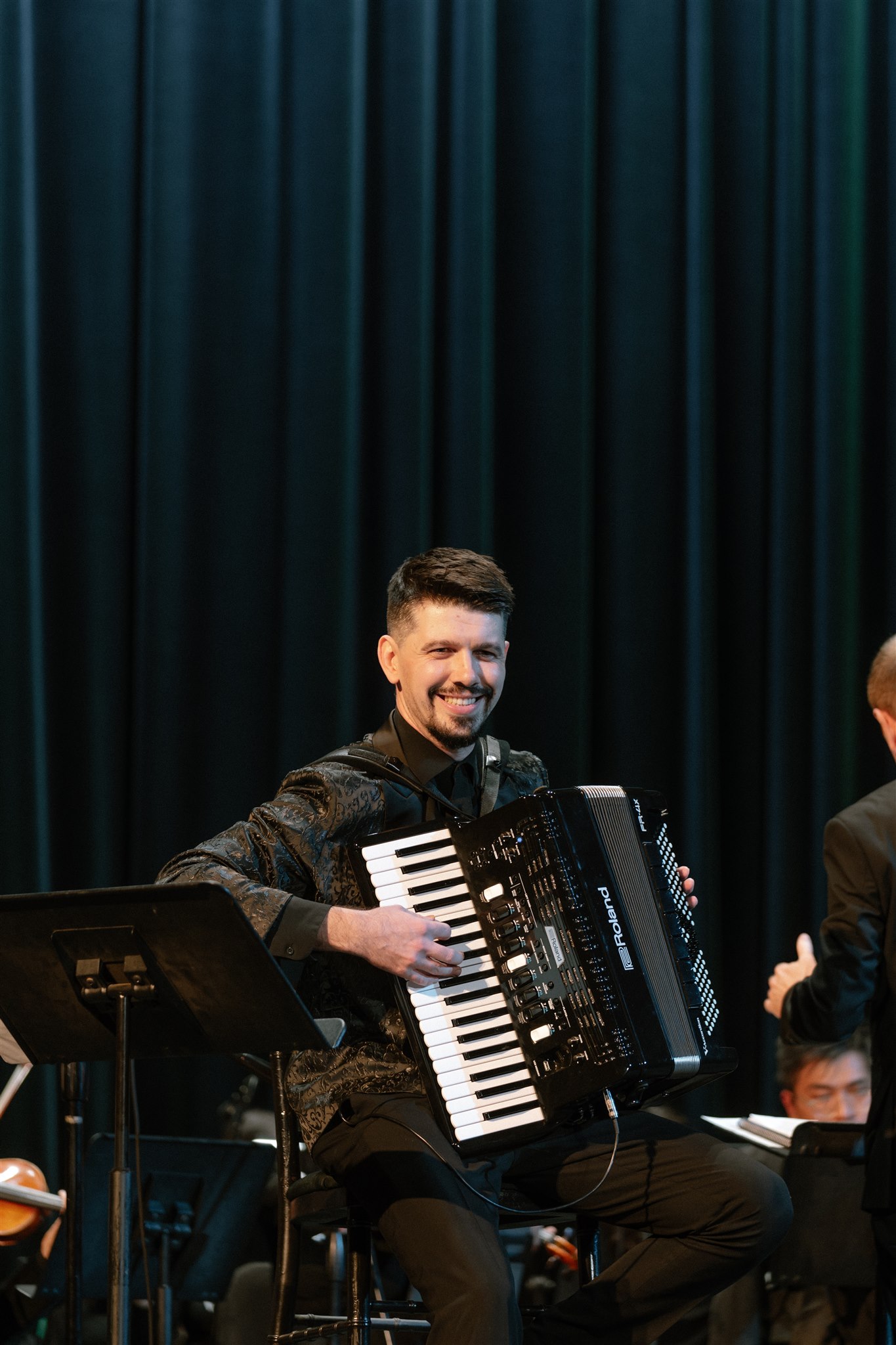 Aleksei Chebeliuk performing with orchestra