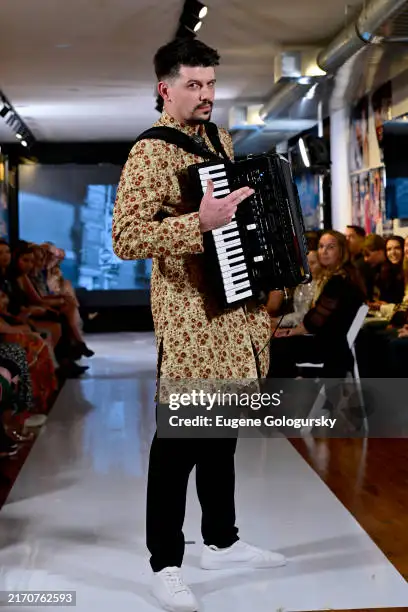 Aleksei Chebeliuk performing at a fashion event